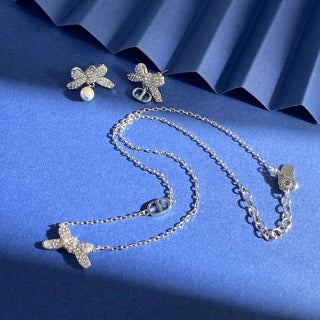 Dior Bow Pearl Butterfly Earrings