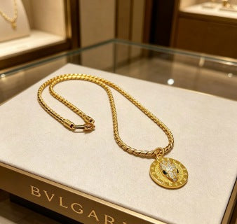 Bvlgari Gold Medallion Pendant Chain Necklace – Elegant Luxury Jewelry