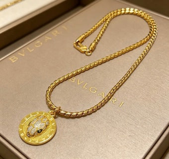 Bvlgari Gold Medallion Pendant Chain Necklace – Elegant Luxury Jewelry